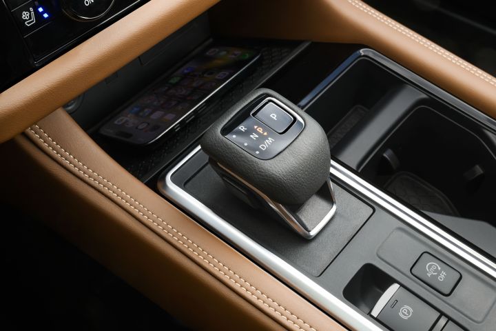 The gear shift and cupholder inside the 2026 Nissan Pathfinder.