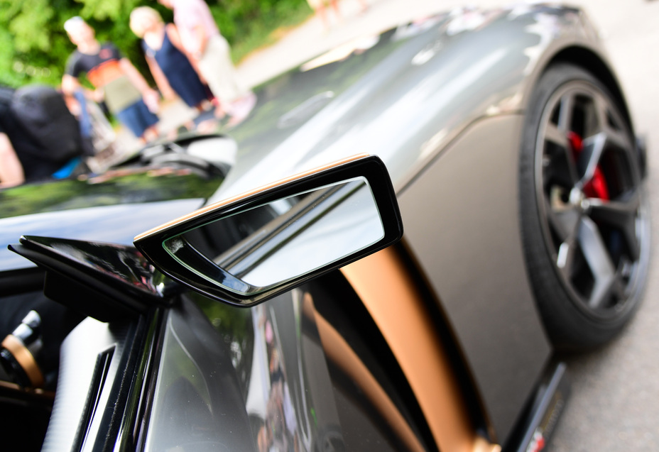 A close up of the mirror on the Nissan GT-R50