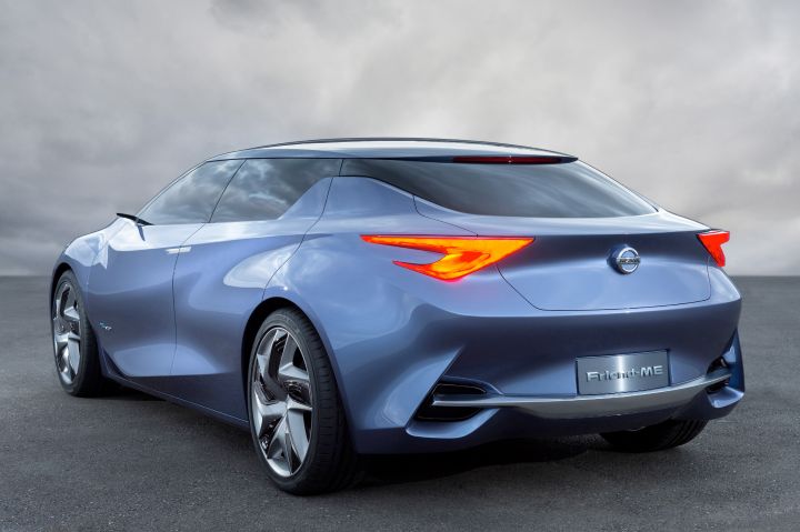 a back and side profile view of a parked Nissan Friend-ME Concept vehicle