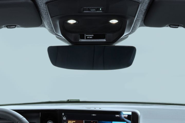 detailed shot of rear-view mirror and overhead reading lights