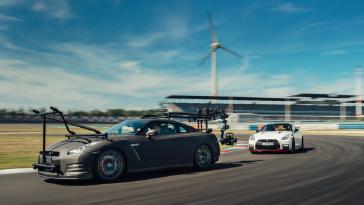 The purpose-built Nissan GT-R camera car is fitted with a bespoke tubular structure that was welded to the chassis and able to hold the weight of the professional carbon-fiber gimbal camera mounting system. Thanks to its low center of gravity, adjustable sports suspension and four-seater configuration, the GT-R is the perfect base car to accommodate a camera rig of this type. 