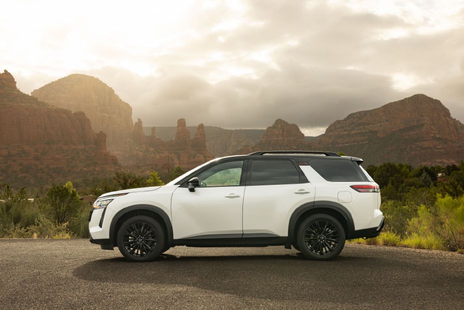 Left profile view of the 2027 Nissan Pathfinder Special Edition overlooking a canyon on a foggy day.