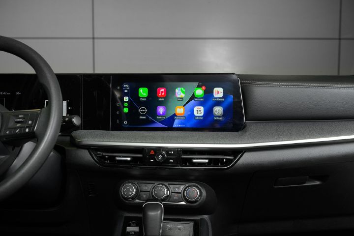 The dashboard display inside the 2026 Nissan Kicks, the home screen is featured.