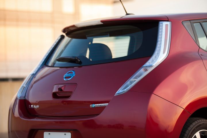 the back of a red 2013 Nissan LEAF