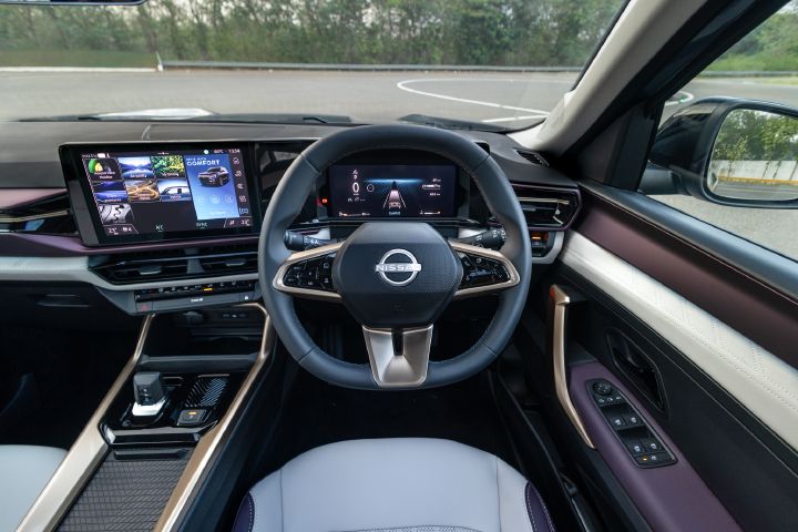 Driver-focused view of the Tekton cockpit with digital displays, multifunction steering wheel and intuitive controls.