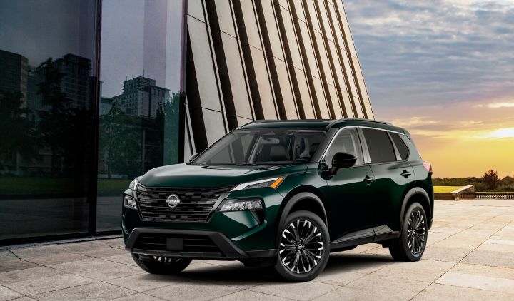 Front left 3/4 angle of the 2026 Nissan Rogue Dark Armor at sunset.
