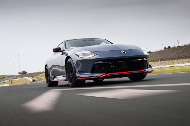Front right angled view of the 2027 Nissan Z NISMO Manual Transmission parked on a racetra