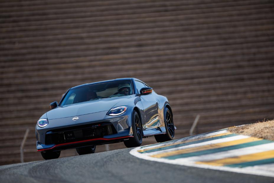 The 2024 Nissan Z NISMO rounding a corner on the track.