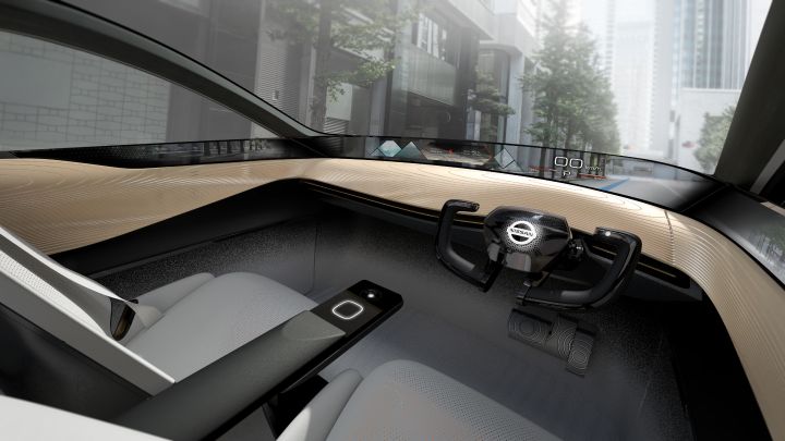 A close up rendering of the drivers seat view inside the Nissan IMx KURO concept