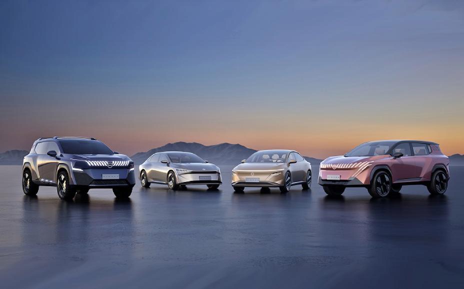A photo of four NEV Concepts parked on the road