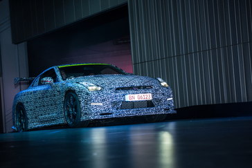 TOKYO (November 19, 2013) - On a stage, under lights and before the flash of cameras, the new Nissan GT-R and GT-R NISMO bowed on the eve of the Tokyo International Motor Show.