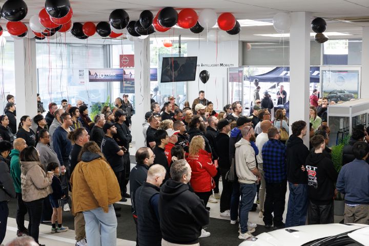 A crowd within the showroom of Ferntree Gully Nissan