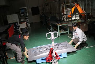 Nissan has developed “dual-sided dieless forming,” a technique using robots to make car parts out of sheet steel. This could make replacement parts for discontinued models more widely available for customers. Thanks to its flexible production, short lead times and minimal upfront costs, the new technique could make it commercially viable to produce and sell a wide variety of after-service and replacement parts in small volumes for cars that Nissan no longer makes. This was previously not possible due to the high upfront costs and long lead times to develop and make dies for stamped parts.