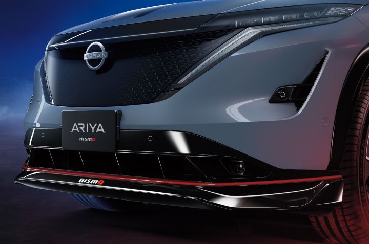 Close-up shot of Ariya NISMO, focus on the front bumper