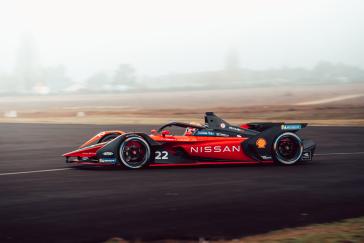 The Nissan e.dams Formula E race car has a dramatic black and red design inspired by the Japanese kimono. The #23 Nissan Ariya Formula E car is being driven by Sebastien Buemi, and the #22 Nissan LEAF Formula E car is being driven by Maximilian Guenther.