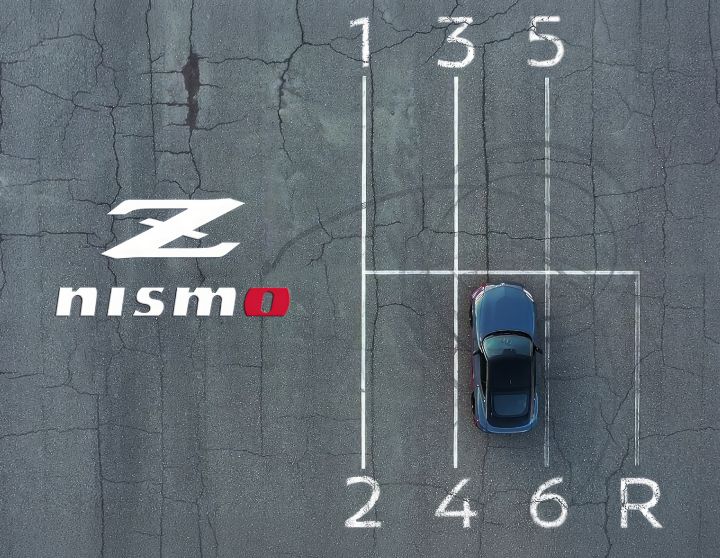 Aerial view of the 2027 Nissan Z NISMO MT parked in parking lanes, a Z NISMO logo can be seen on the right side.
