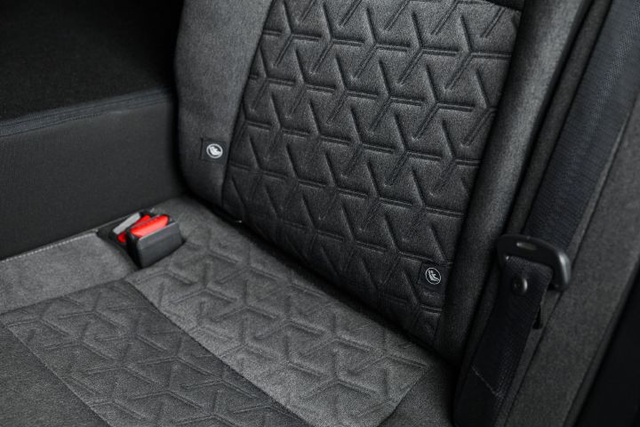 Close up of the texture of the seats inside the 2026 Nissan Kicks.