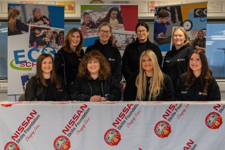 Nissan skills Foundation posing in front of background