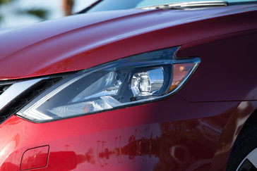 The new 2016 Nissan Sentra exterior redesign brings its appearance closer in look and feel to its more upscale showroom siblings. All three Nissan sedans – Maxima, Altima and now Sentra – reflect Nissan’s new design language first introduced on the dramatic Nissan Murano crossover. Key features of the 2016 Sentra exterior include a new front fascia, grille, fenders, hood and signature boomerang-shaped headlights. New LED low-beam headlights with LED signature accents are offered on Sentra SR and Sentra SL grades.