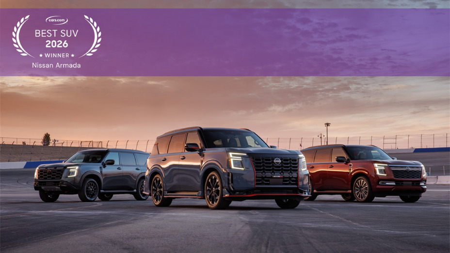 Three Nissan Armadas parked at different angles during sunset.