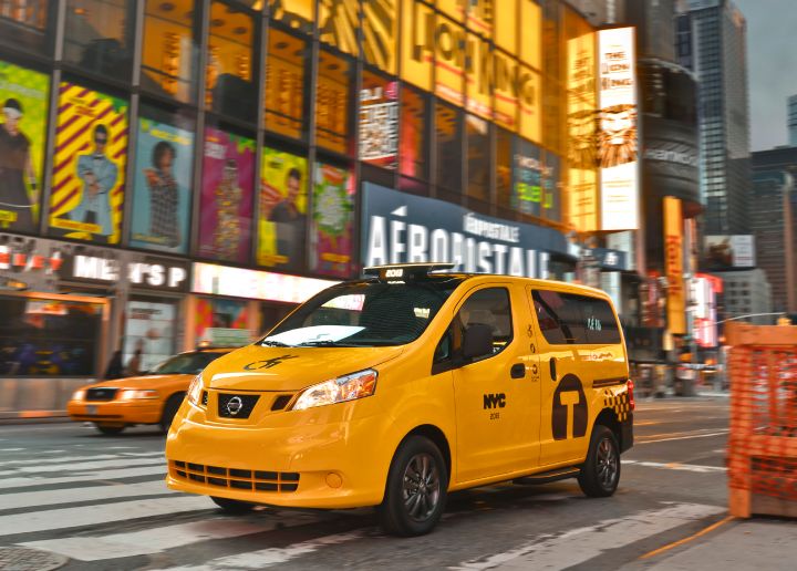 the  Nissan NV200 Mobility Taxi on the street