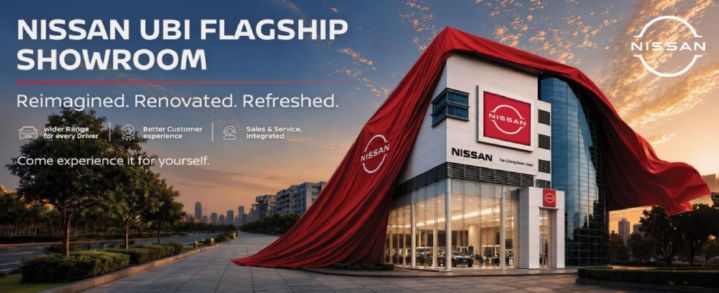 Nissan Ubi Flagship Showroom in Singapore, featuring a modern showroom building draped with a large red fabric and Nissan branding.