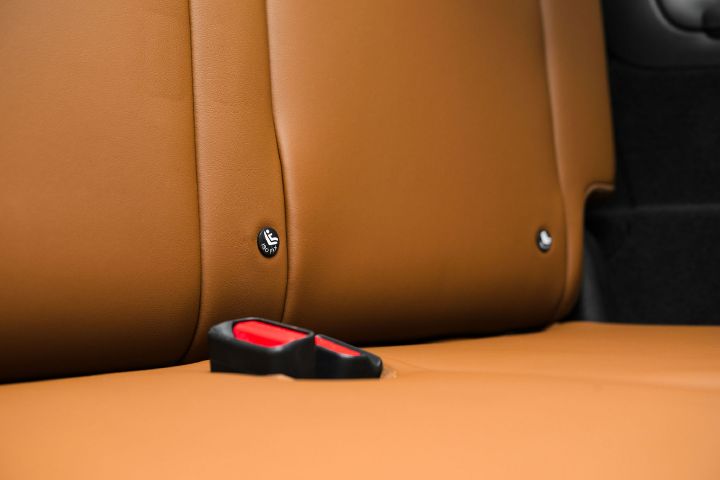 Close up of the textiles inside the 2026 Nissan Pathfinder, featuring child safety seat labels.