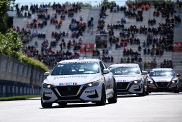 Stefan Rzadzinski and two other racers driving on the track.