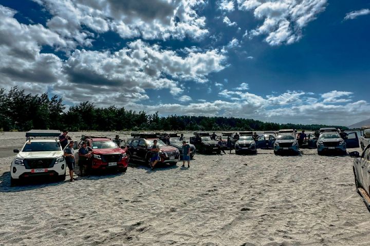 Media participants parked their Nissan Terra and Navara  on a sandy beach