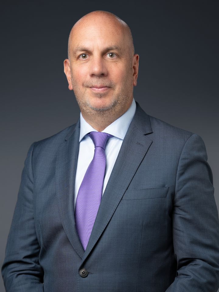 Portrait of Timothy Ryan (suit, tie)