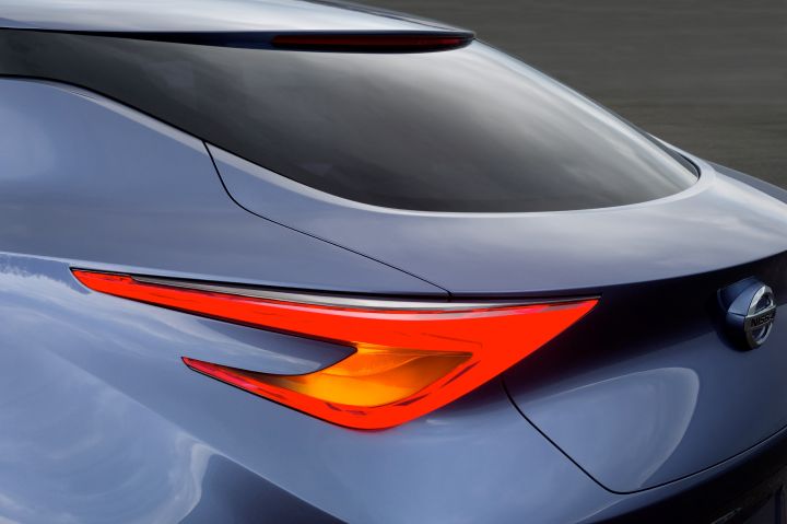 left tail light of a blue vehicle