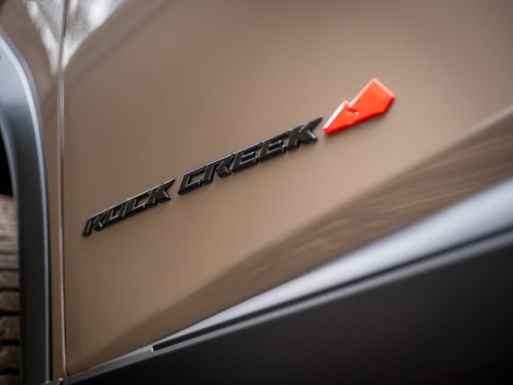 Close up of Rock Creek decal on a tan 2025 Nissan Rogue rock creek.
