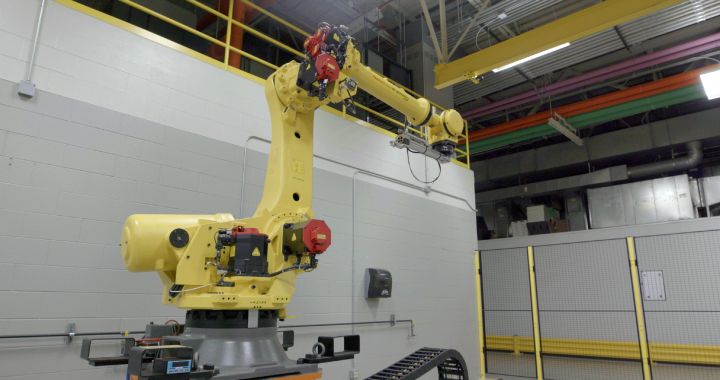 Yellow Robot Arm inside building